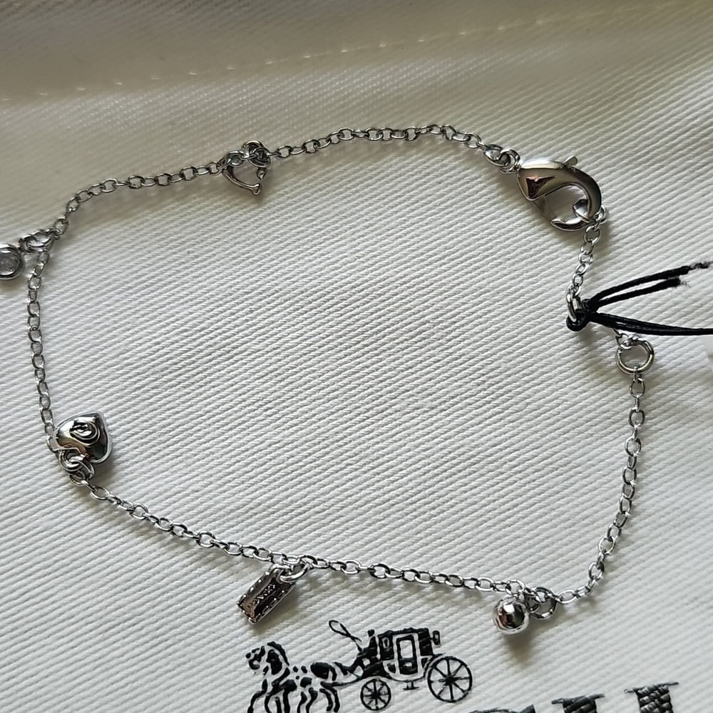 Coach Silver-Tone Heart & Charm Delicate Bracelet - Picture 2 of 4